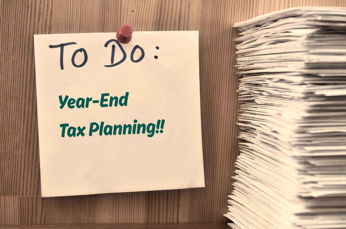 To do list on a sticky note with "Year-End Tax Planning" on it