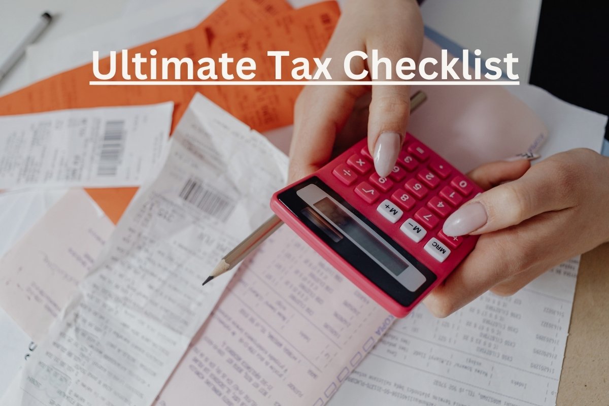 Desk with lots of receipts and a calculator